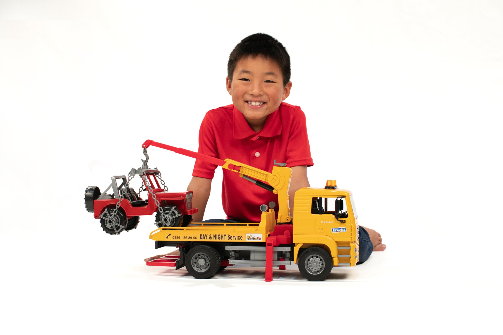 Bruder 02750 Man TGA Tow Truck with Off-Road Vehicle 20.12.8