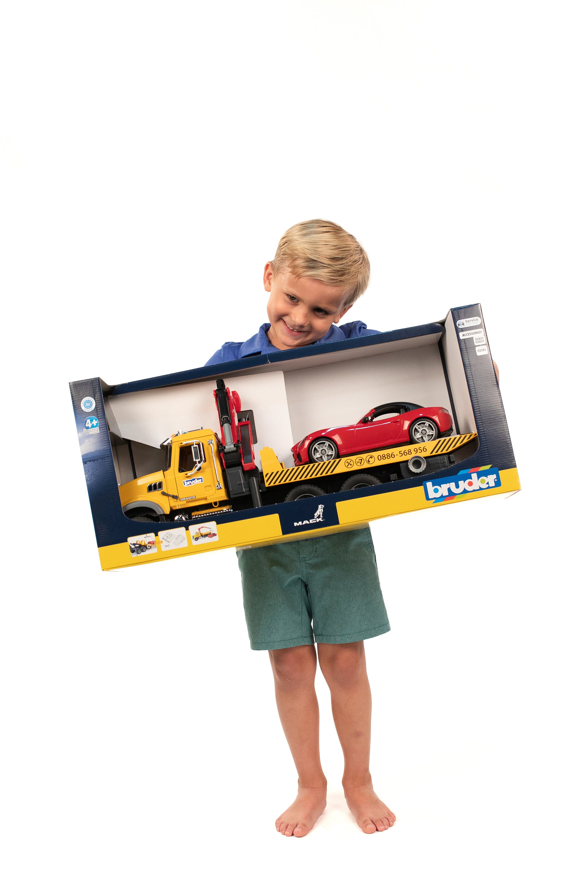 Bruder MACK Granite Tow Truck with Roadster Bruder MACK Granite Tow Truck with Roadster