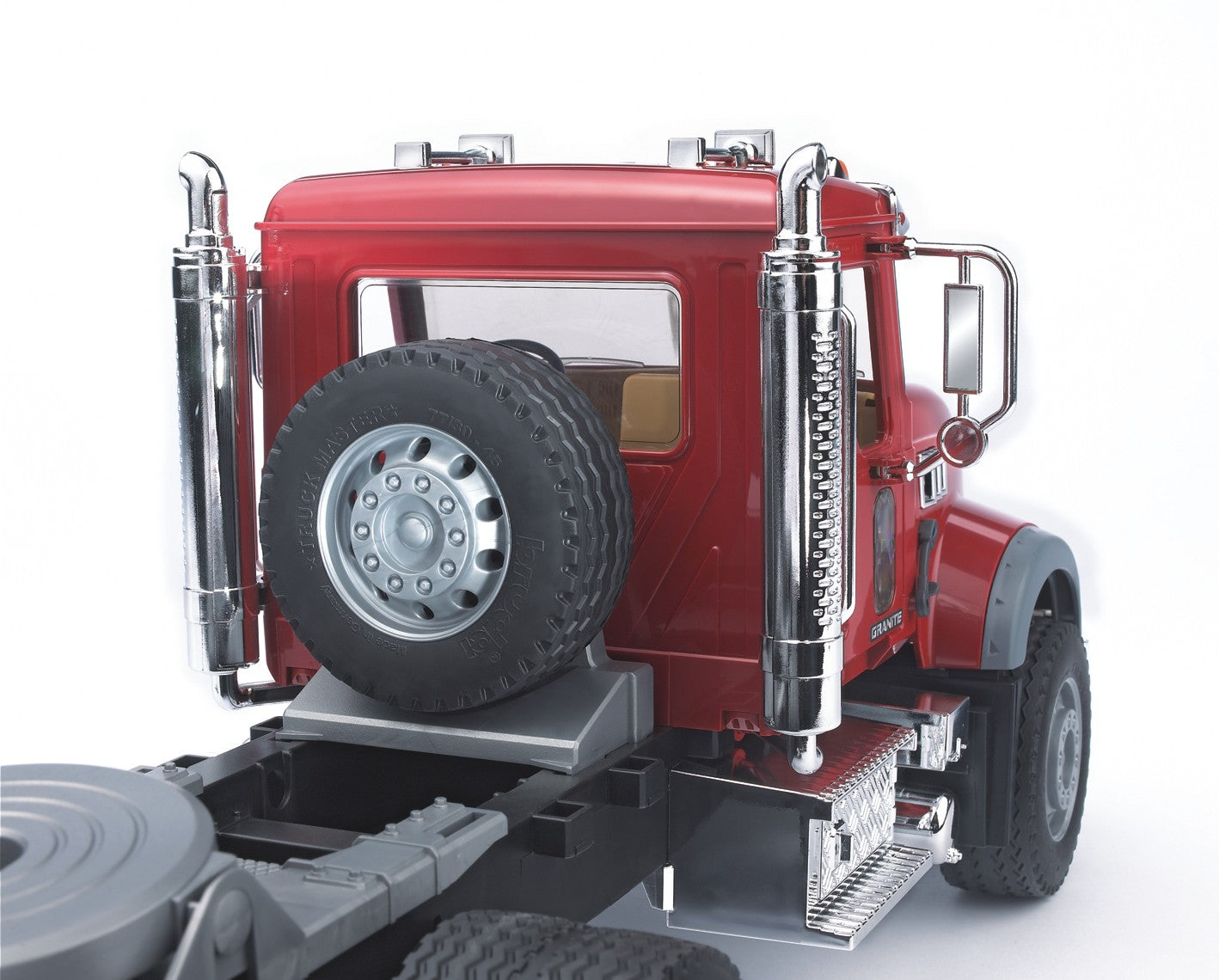 MACK Granite Low loader truck with JCB 4CX Backhoe loa – Bruder