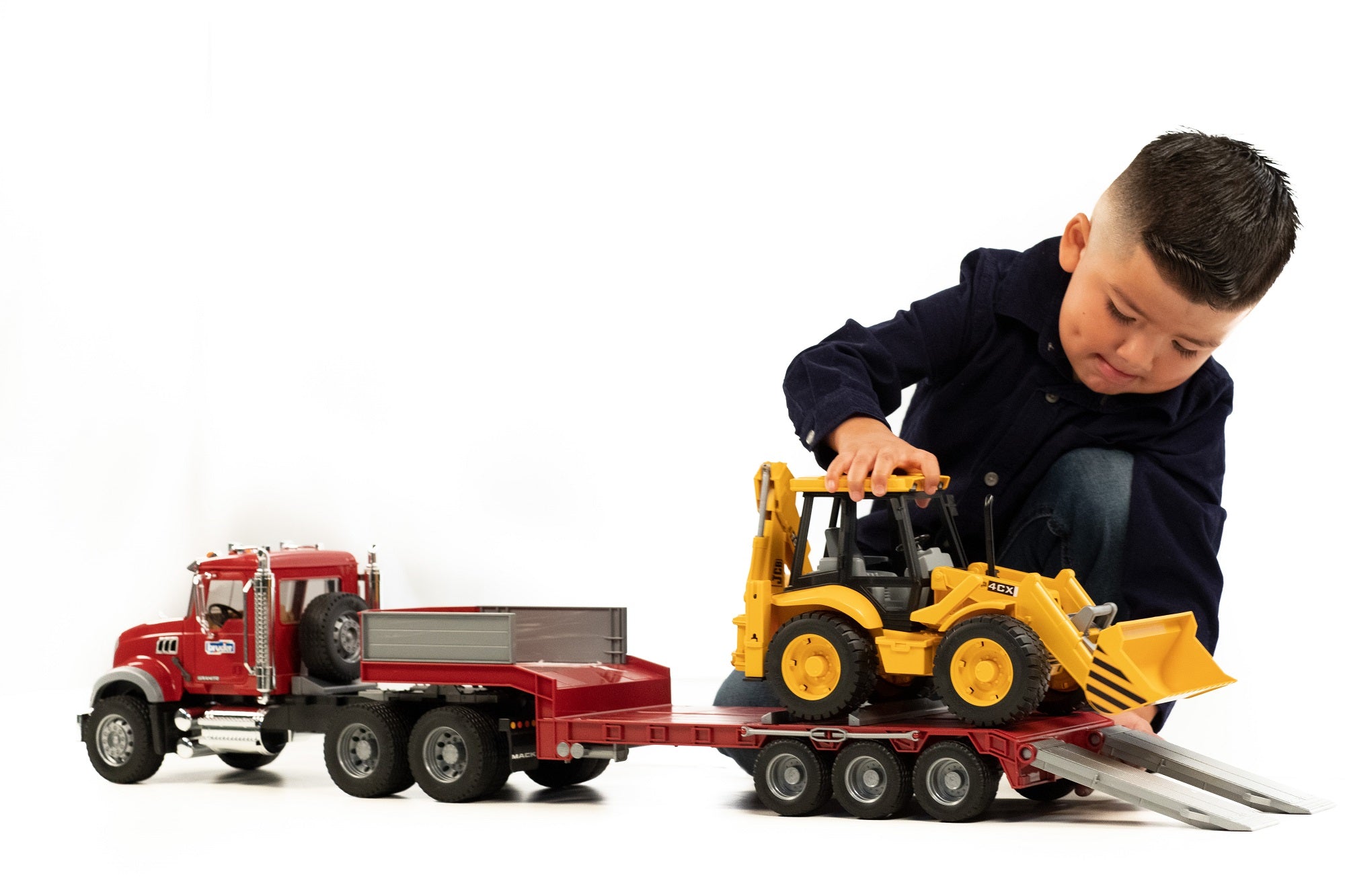 MACK Granite Low loader truck with JCB 4CX Backhoe loa – Bruder
